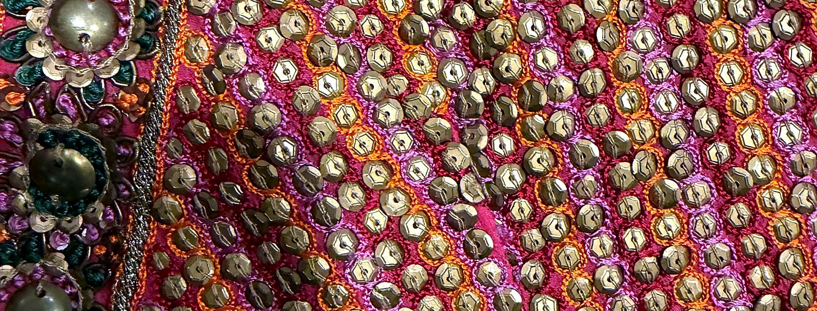 Hand-set sequins and resham embroidery on silk